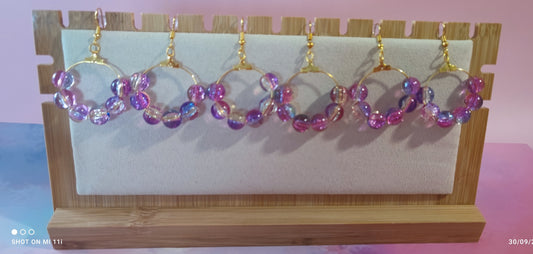 Boucles d'oreilles ( Femme et jeune fille à partir de 18 ans ).