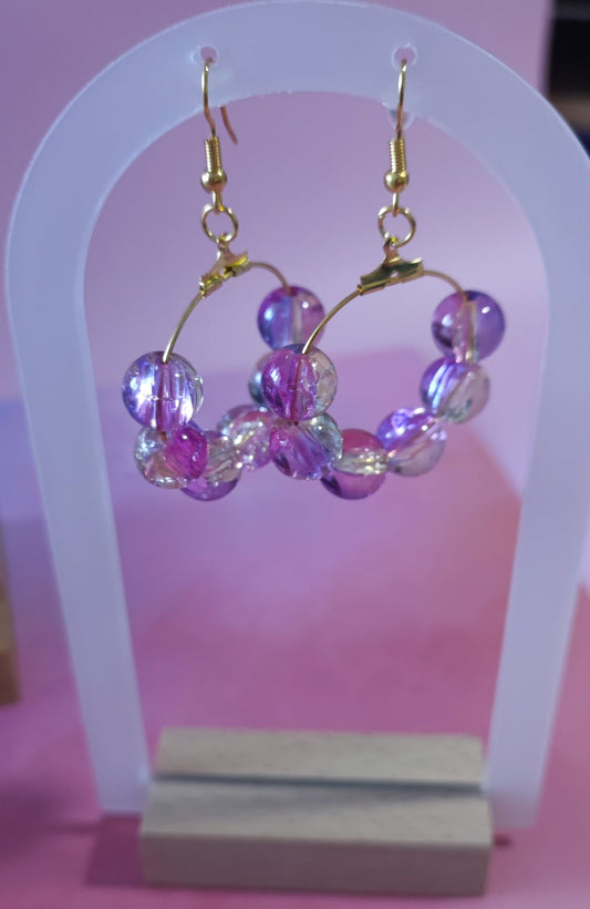 Boucles d'oreilles ( Femme et jeune fille à partir de 18 ans ).
